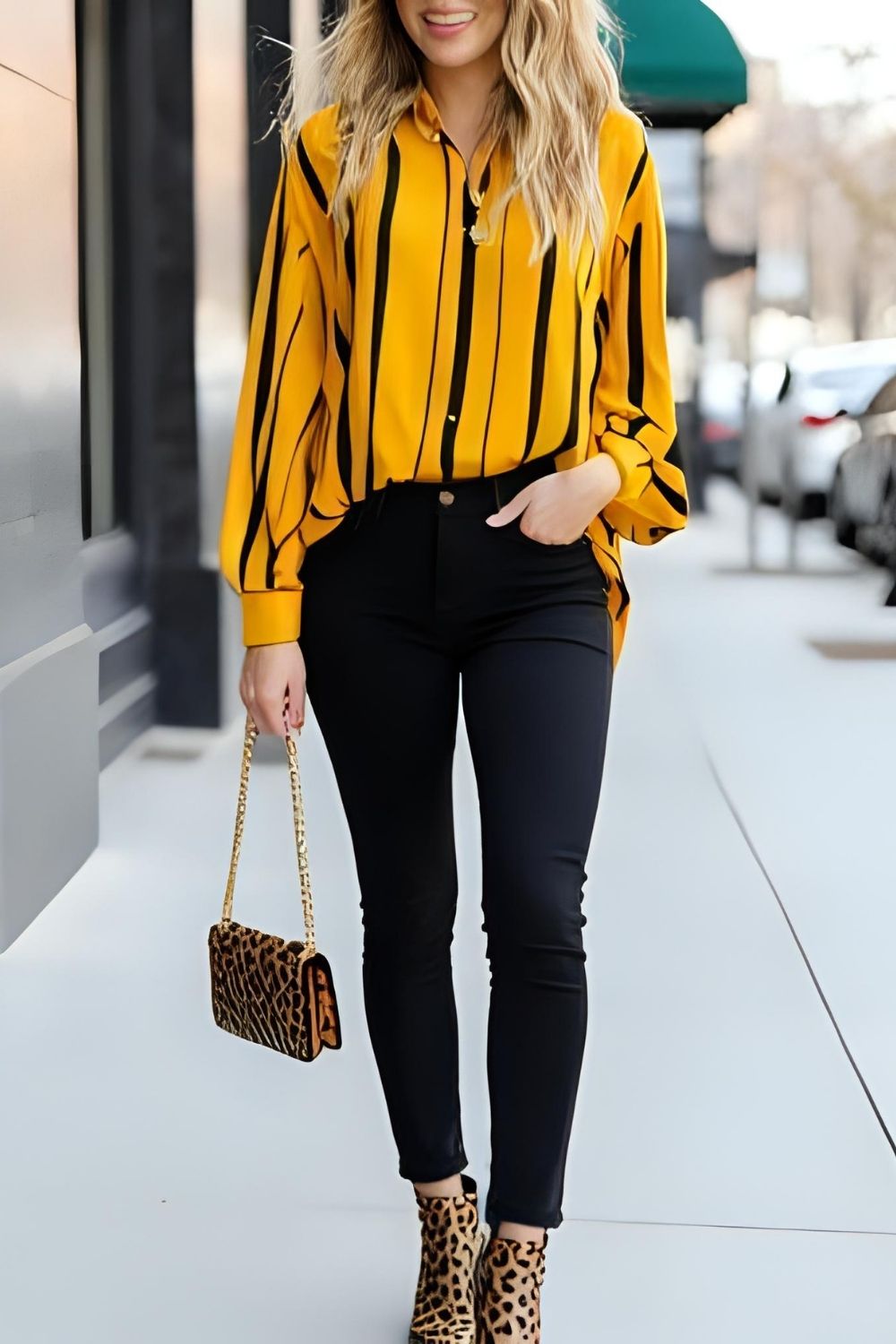 Playful Prints: Black Jeans, Yellow Shirt with Black Stripes, Printed Bag, and Matching Printed Shoes