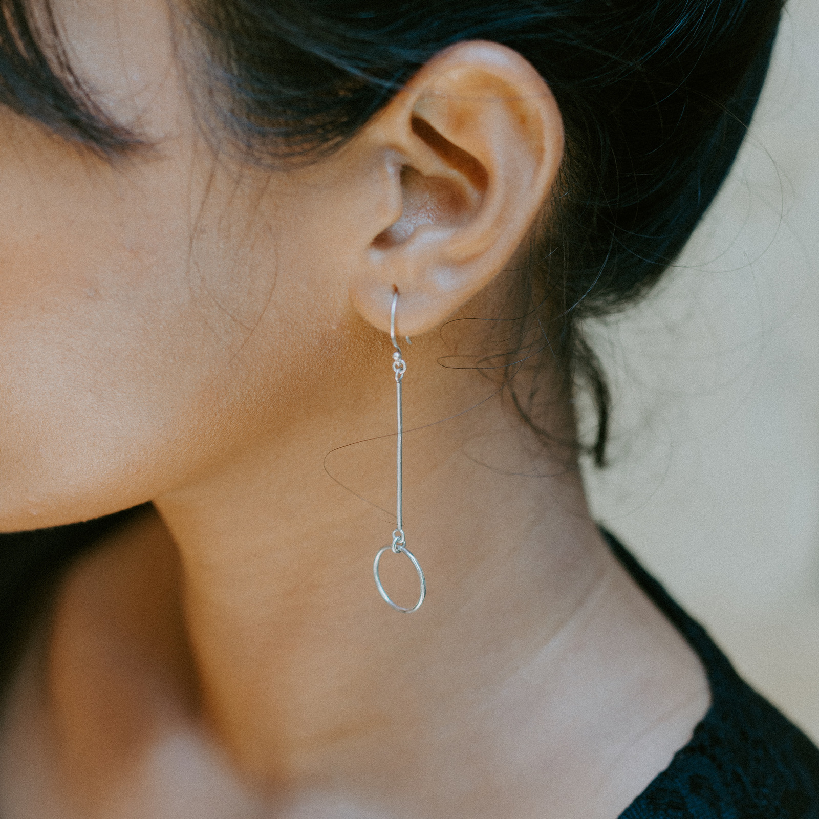 Woman Wearing Silver-colored Earring Woman Wearing Silver-colored Earring